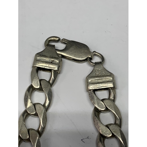 554 - A HEAVY SILVER FLAT LINK BRACELET