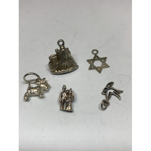 583 - TEN VARIOUS SILVER CHARMS