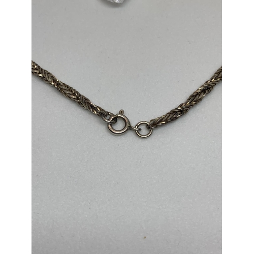 592 - A SILVER NECKLACE IN A PRESENTATION BOX