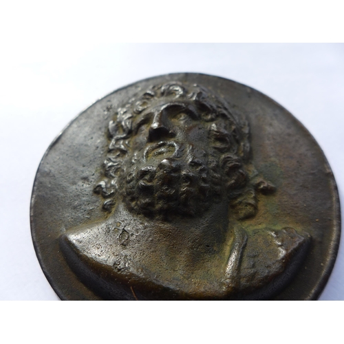 309 - A LARGE RENAISSANCE TYPE BRONZE UNIFACE MEDAL OF A GOD, DIAMETER 8CM, CAST IN HIGH RELIEF