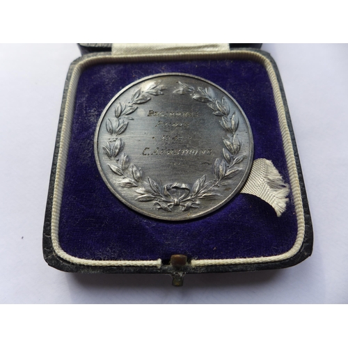 315 - A CASED MANCHESTER AMATEUR PHOTOGRAPHY PRIZE MEDAL AWARDED TO C.ARMSTRONG 1943, 45MM, BY FATTORINI