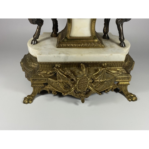 11 - A C.1900 ITALIAN REPRODUCTION MANTLE CLOCK BY IMPERIAL IN BRASS WITH MARBLE BASE AND CHERUBS, HEIGHT... 