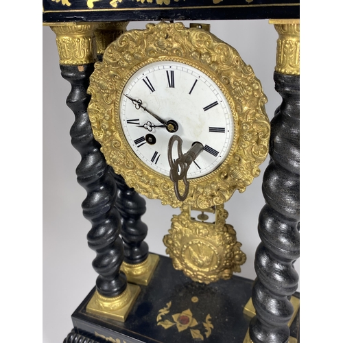 15 - A JAPY FERERES MOVEMENT DECORATIVE EBONISED STYLE COLUMN CLOCK WITH PENDULUM & KEY, HEIGHT 50CM