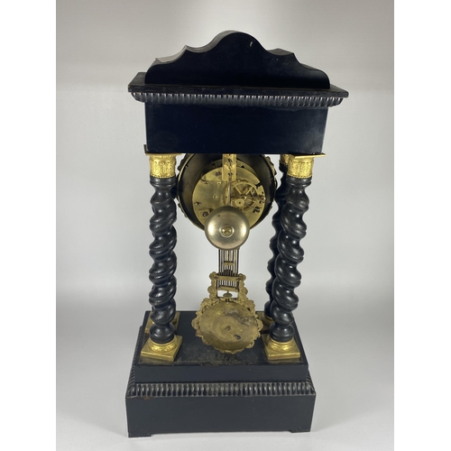 15 - A JAPY FERERES MOVEMENT DECORATIVE EBONISED STYLE COLUMN CLOCK WITH PENDULUM & KEY, HEIGHT 50CM