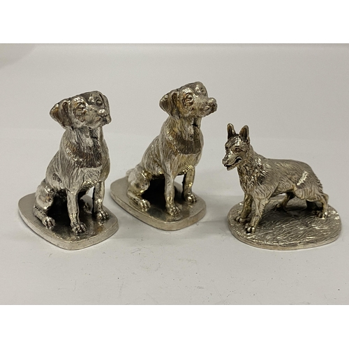 27 - A GROUP OF THREE HALLMARKED SILVER FILLED CAMELOT SILVERWARE LTD DOG FIGURES