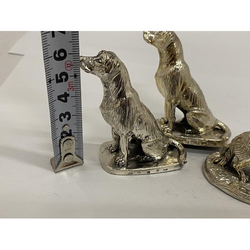 27 - A GROUP OF THREE HALLMARKED SILVER FILLED CAMELOT SILVERWARE LTD DOG FIGURES