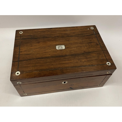 32 - AN ANTIQUE ROSEWOOD AND MOTHER OF PEARL JEWELLERY BOX, LENGTH 25CM