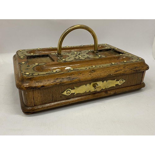 36 - A VINTAGE OAK AND BRASS DESK STAND