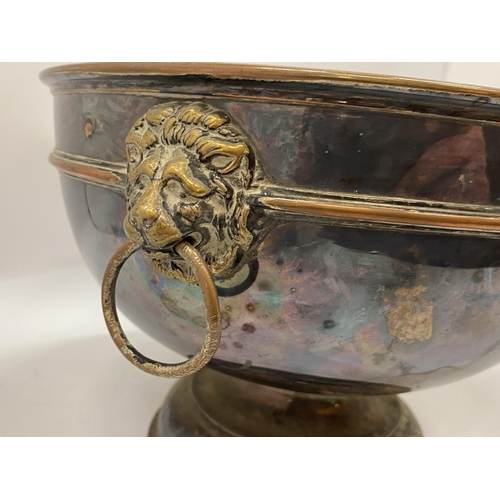 38 - A VINTAGE SILVER PLATED PUNCH BOWL WITH LION HANDLE DESIGN, DIAMETER 26CM