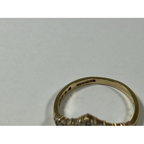 515 - A 9CT GOLD WISHBONE DIAMOND RING, WEIGHT 1.6G