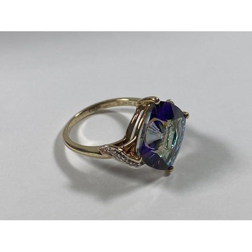 524 - A 9CT GOLD, BLUE & PURPLE ABSTRACT STONE RING,WEIGHT 3.6G, BOXED