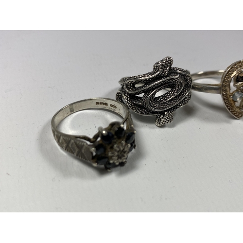 602 - FOUR ASSORTED SILVER RINGS