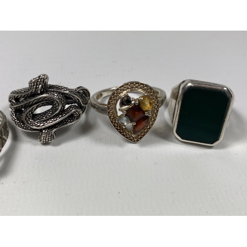 602 - FOUR ASSORTED SILVER RINGS