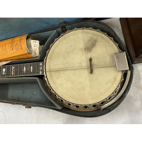 70 - A VINTAGE CASED 'PARAGON' BANJO WITH MOTHER OF PEARL FRETBOARD