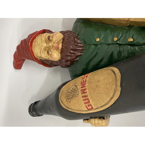 81 - A WOODEN GUINNESS LEPRACHAUN FIGURE, HEIGHT 37CM