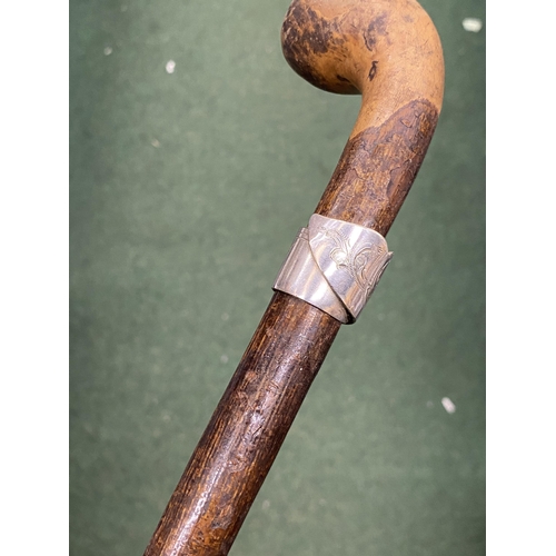 90 - A VINTAGE WOODEN WALKING STICK WITH WHITE METAL FERRULE