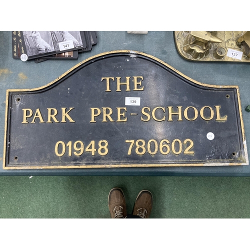 139 - A METAL 'THE PARK PRE-SCHOOL' SIGN 60CM X 30CM