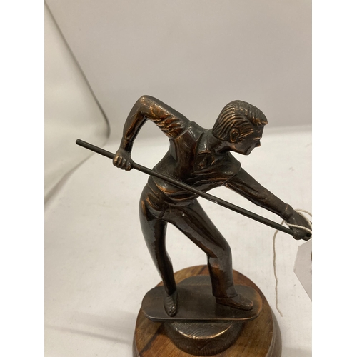 148 - A SPELTER FIGURE OF A SNOOKER PLAYER ON A WOODEN PLINTH HEIGHT 21CM