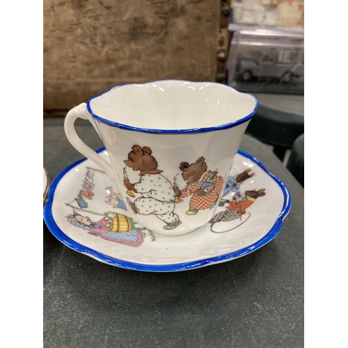 151 - TWO CHINA NURSERY CUPS AND SAUCERS