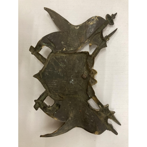 172 - A BRASS COAT OF ARMS LENGTH 19CM