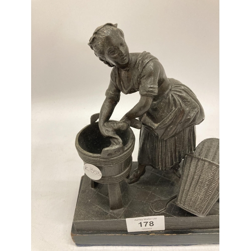 178 - A VINTAGE METAL MODEL OF A WASHER WOMAN HEIGHT 22CM