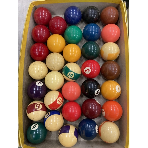 180 - A LARGE QUANTITY OF SNOOKER AND POOL BALLS WITH A TRIANGLE AND CHALK