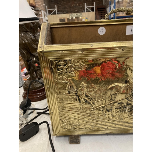 181 - A BRASS MAGAZINE RACK WITH SHIRE HORSE DESIGN