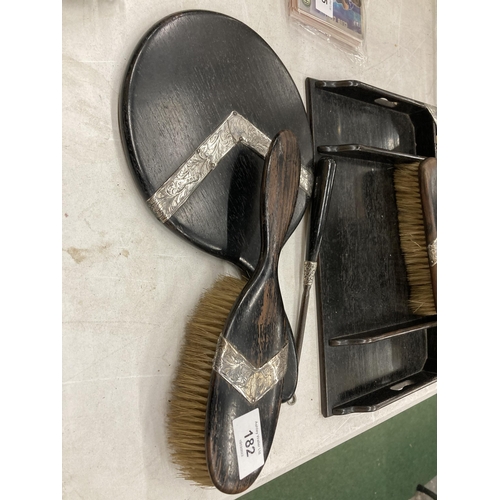 182 - A SILVER AND EBONY DRESSING TABLE SET