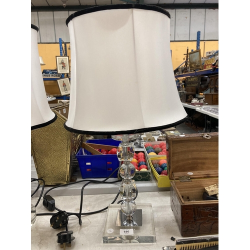 186 - TWO MODERN GLASS TABLE LAMPS WITH BLACK AND WHITE SHADES