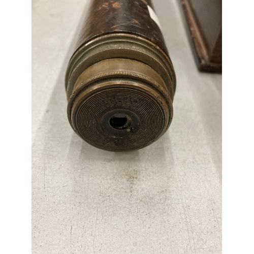 205 - A VINTAGE LEATHER BOUND TELESCOPE