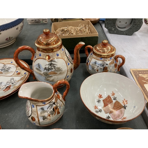 210 - AN ORIENTAL STYLE TEASET TO INCLUDE TRIOS, TEAPOT, JUG, LIDDED SUGAR BOWL ETC