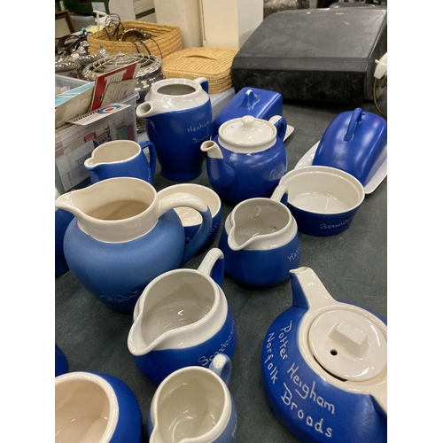 264 - A LARGE QUANTITY OF TORQUAY AND DEVONWARE TO INCLUDE JUGS, BUTTER DISHES, ETC