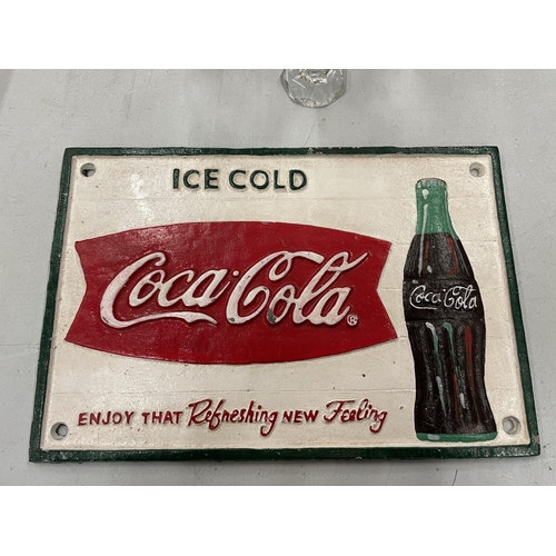 913 - A CAST 'ICE COLD COCA-COLA' SIGN 29CM X 20CM