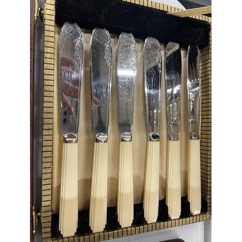 917 - A BOXED SET OF FISH KNIVES AND FORKS AND A BOXED SERVING SET