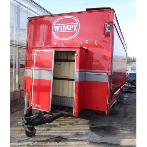 239 - A WIMPEY TRIPLE AXLE CATERING TRAILER WITH SOME FIRE DAMAGE NO VAT