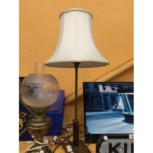 293 - TWO LAMPS TO INCLUDE A BRASS OIL LAMP WITH GLASS FUNNEL AND SHADE AND A FRUTHER MODERN LAMP