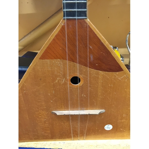 297 - A RUSSIAN THREE STRINGED BALALAIKA