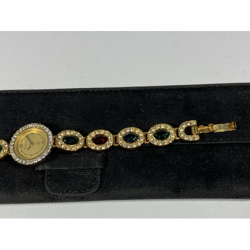 628 - A LADIES CHANDLER JEWELLED WATCH WITH ORIGINAL POUCH