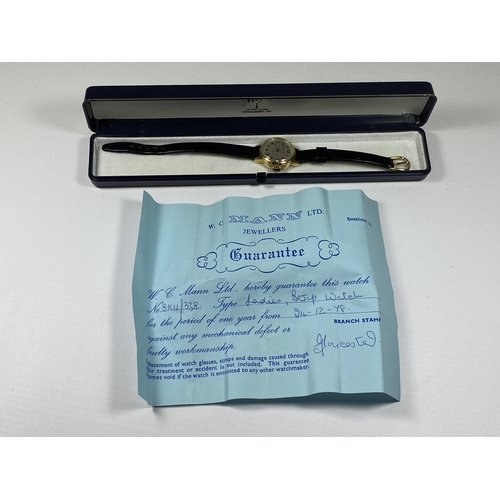 629 - A BOXED MANN ANTICHOC DATE WATCH WITH PAPERS