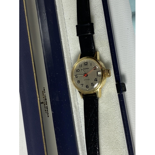 629 - A BOXED MANN ANTICHOC DATE WATCH WITH PAPERS