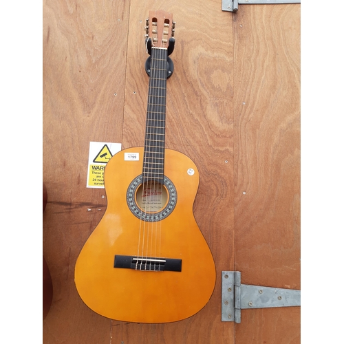 1799 - A FREEDOM ACOUSTIC GUITAR