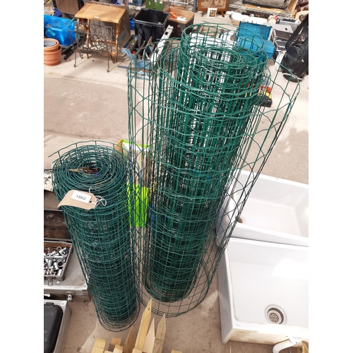 1802 - TWO PART ROLLS OF GREEN MESH FENCING WIRE