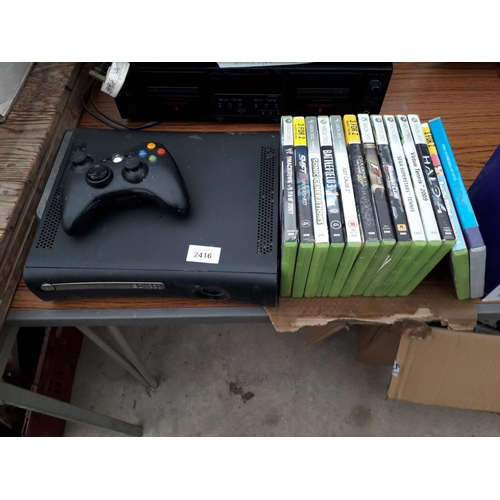 2416 - AN XBOX 360 WITH CONTROLLER AND AN ASSORTMENT OF GAMES