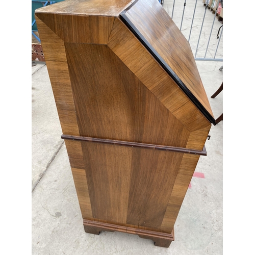 2995 - A WALNUT EFFECT KNEEHOLE PEDESTAL BUREAU