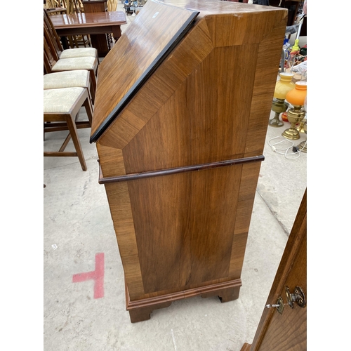 2995 - A WALNUT EFFECT KNEEHOLE PEDESTAL BUREAU