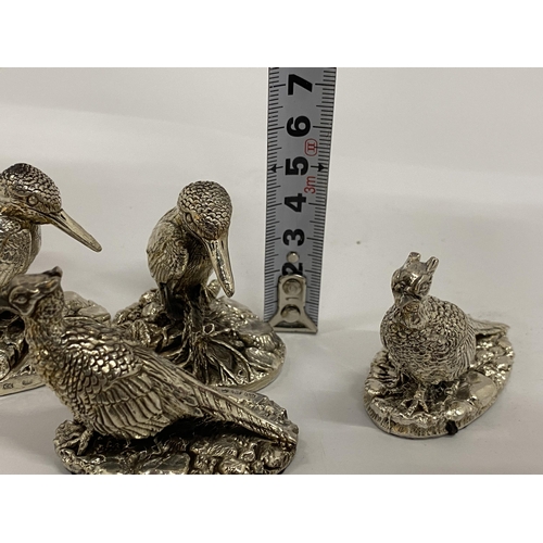 19 - A GROUP OF FOUR HALLMARKED SILVER FILLED CAMELOT SILVERWARE LTD BIRD FIGURES