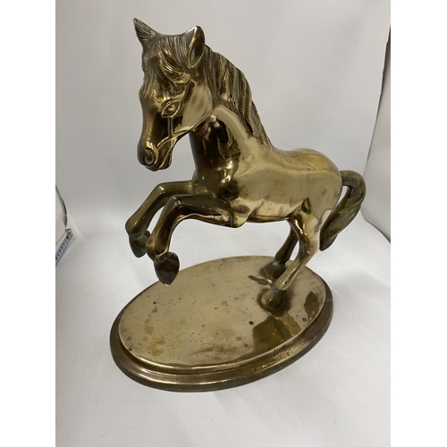 102 - A LARGE BRASS MODEL OF A REARING HORSE, HEIGHT 37CM