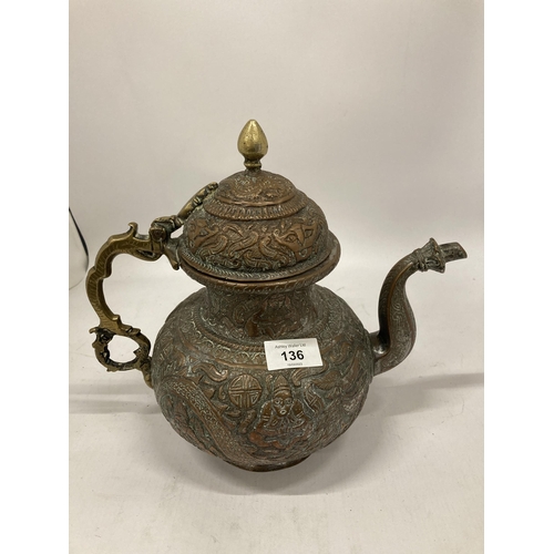 136 - A LARGE COPPER AND BRASS COFFEE POT WITH ORNATE ENGRAVED DECORATION HEIGHT 28CM