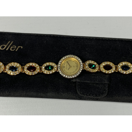 628 - A LADIES CHANDLER JEWELLED WATCH WITH ORIGINAL POUCH