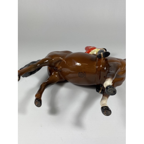 857 - A BESWICK HUNTSMAN ON HORSEBACK FIGURE IN RED JACKET